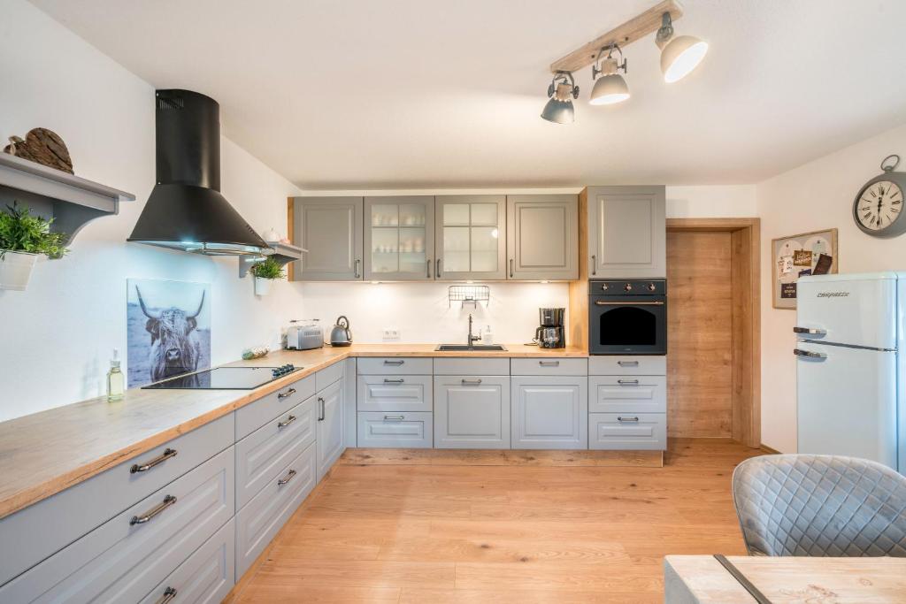 Kuchyň nebo kuchyňský kout v ubytování Wohnung Sunntratn