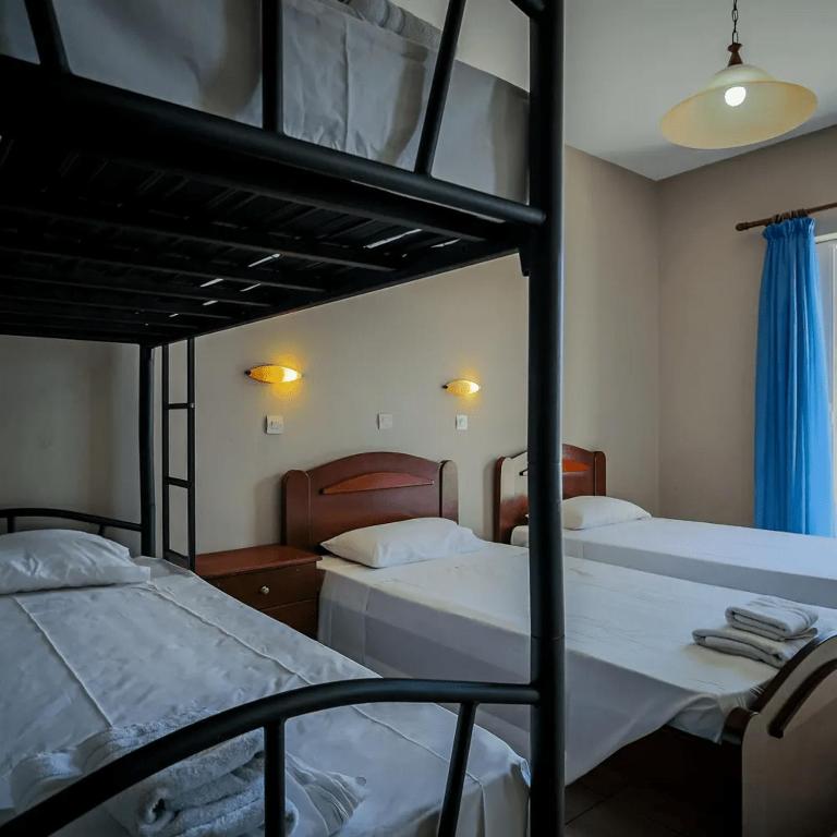 Postel nebo postele na pokoji v ubytování Perkes Hotel Complex