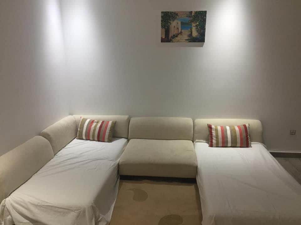 Postel nebo postele na pokoji v ubytování résidence familiale CORAIL