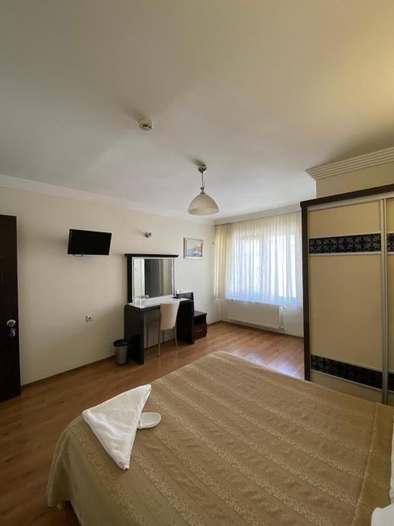 TV a/nebo společenská místnost v ubytování OTEL KING