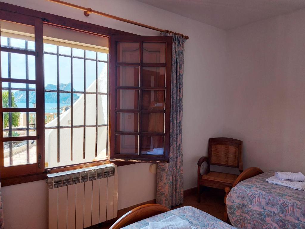 Postel nebo postele na pokoji v ubytování Villa Torreón