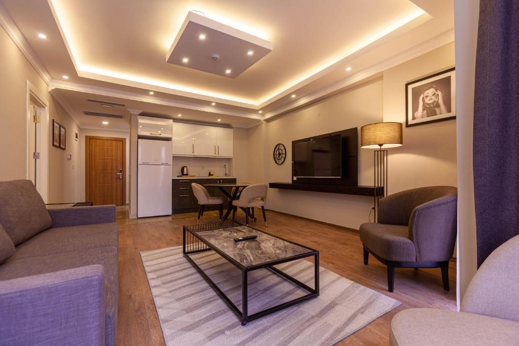 TV a/nebo společenská místnost v ubytování Lilium Luxury Suites