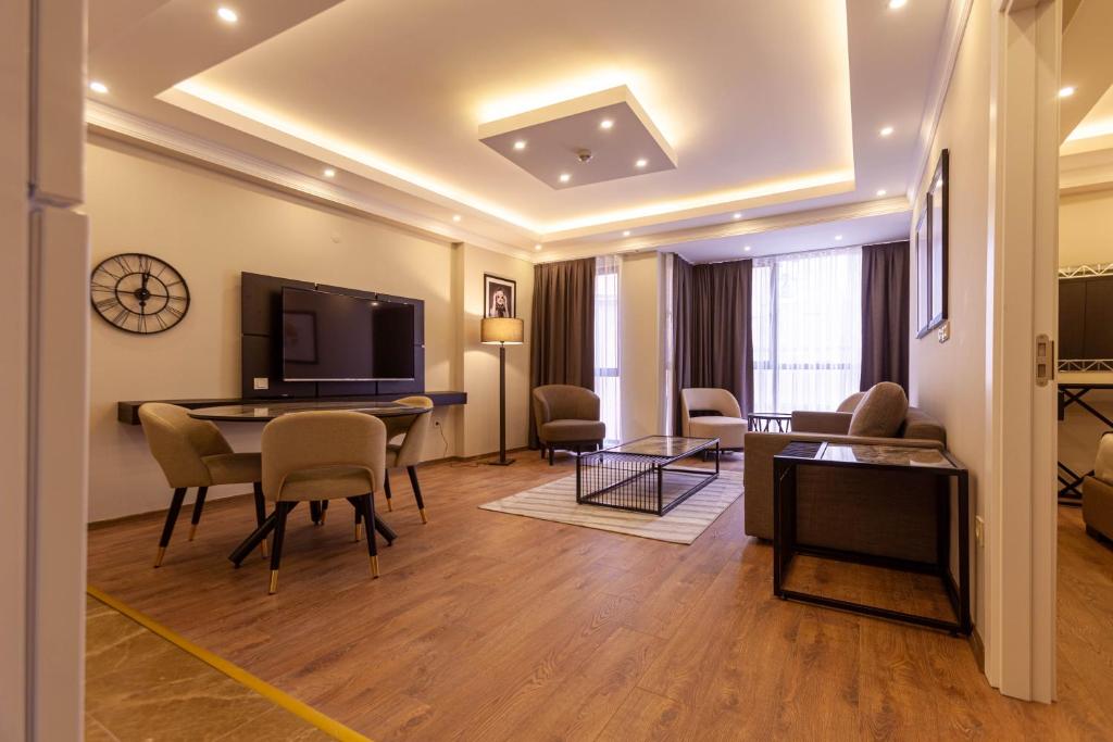 TV a/nebo společenská místnost v ubytování Lilium Luxury Suites