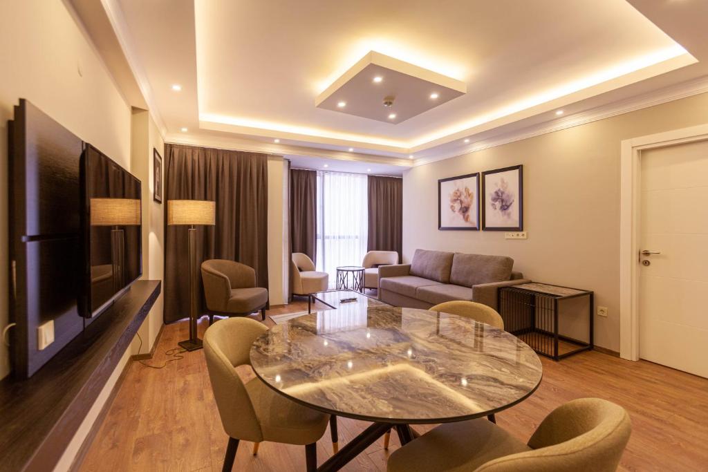 TV a/nebo společenská místnost v ubytování Lilium Luxury Suites