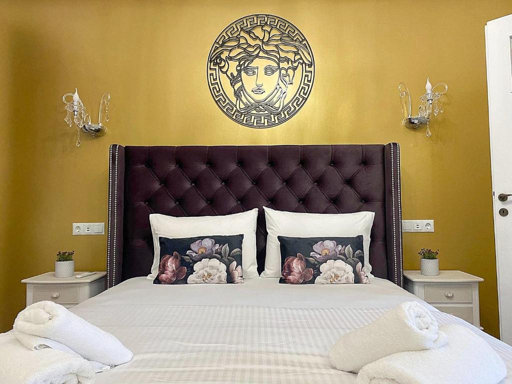 Letto o letti in una camera di Check Point - Acropolis View