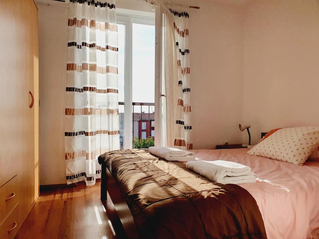 Posteľ alebo postele v izbe v ubytovaní Apartment Gracijela