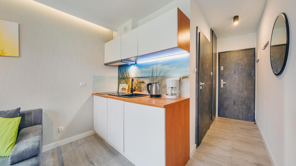 Kuchyň nebo kuchyňský kout v ubytování Apartamenty Sun & Snow Sanatoryjna - blisko plaży