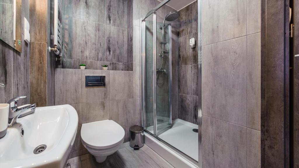 Koupelna v ubytování Apartamenty Sun & Snow Sanatoryjna - blisko plaży