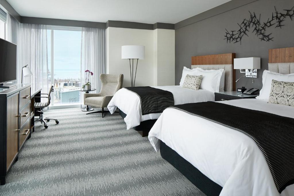 Postel nebo postele na pokoji v ubytování Loews Chicago Hotel
