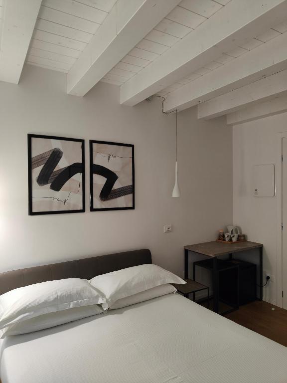 Postel nebo postele na pokoji v ubytování Borgo di Ponte Holiday Apartments & Rooms