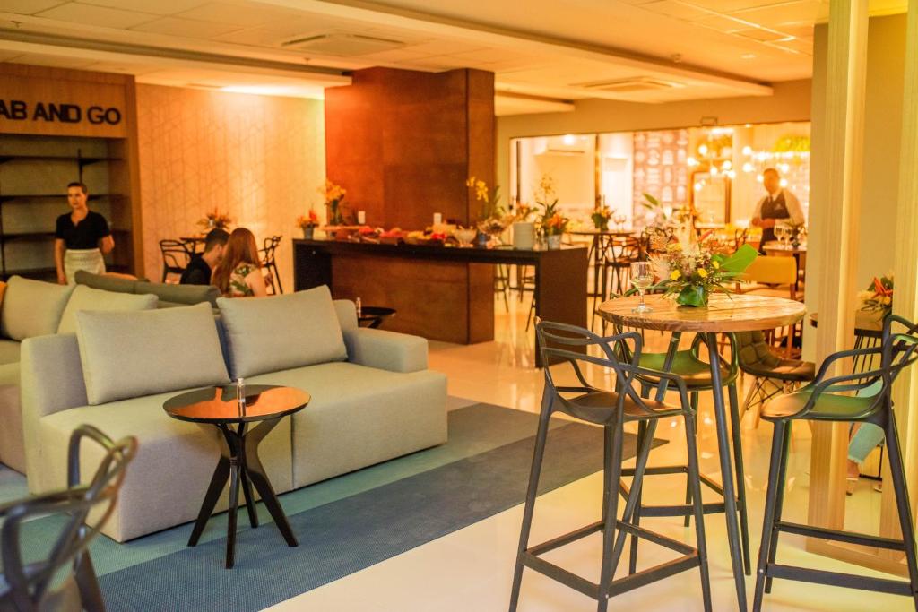 Restaurace v ubytování Conforto no melhor do Marista & Goiânia