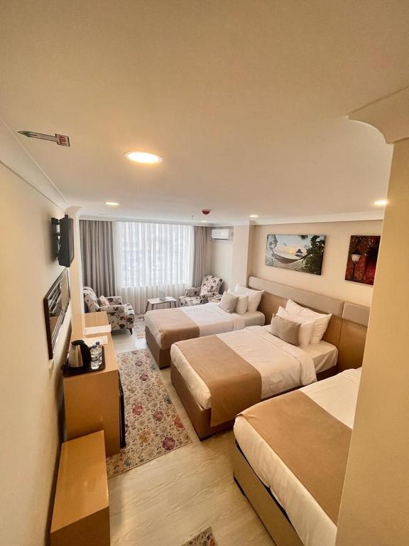 Şimal Hotel - Deluxe Triple Room с видом на море