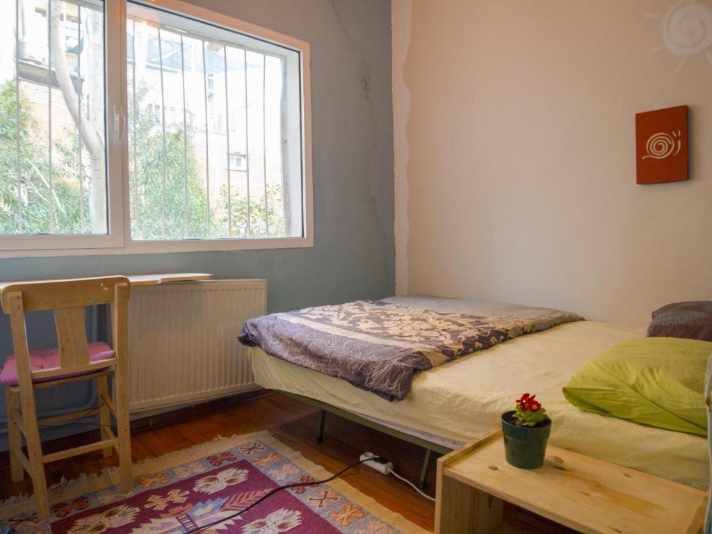 Postel nebo postele na pokoji v ubytování Shantihome