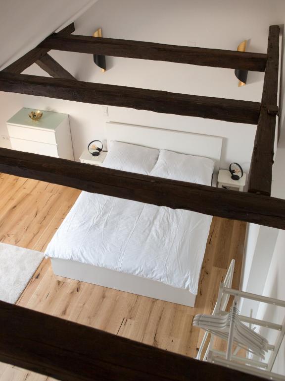 Postel nebo postele na pokoji v ubytování Modern City Apartment
