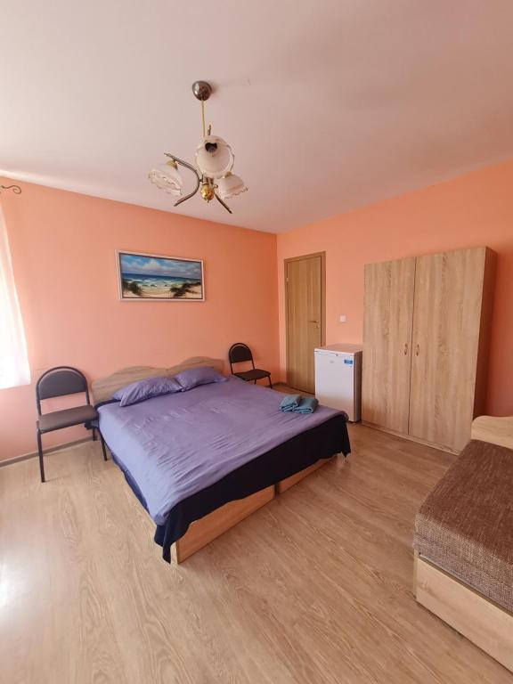 Postel nebo postele na pokoji v ubytování Little Amber Apartments