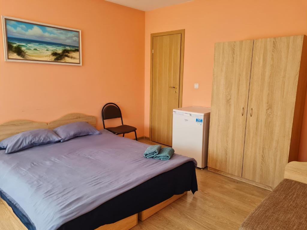Postel nebo postele na pokoji v ubytování Little Amber Apartments