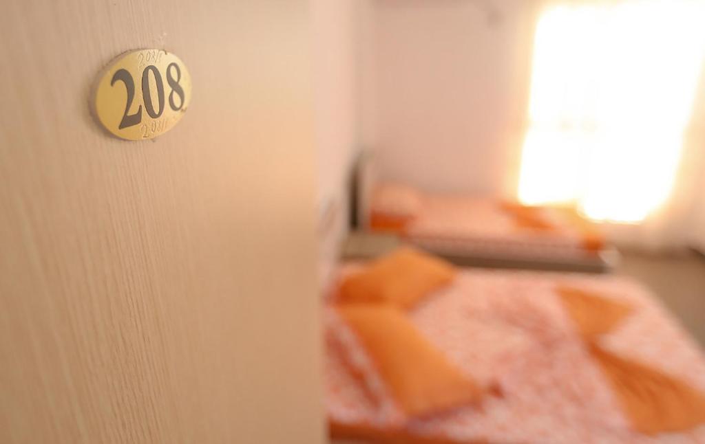 Postel nebo postele na pokoji v ubytování Hotel Jaho