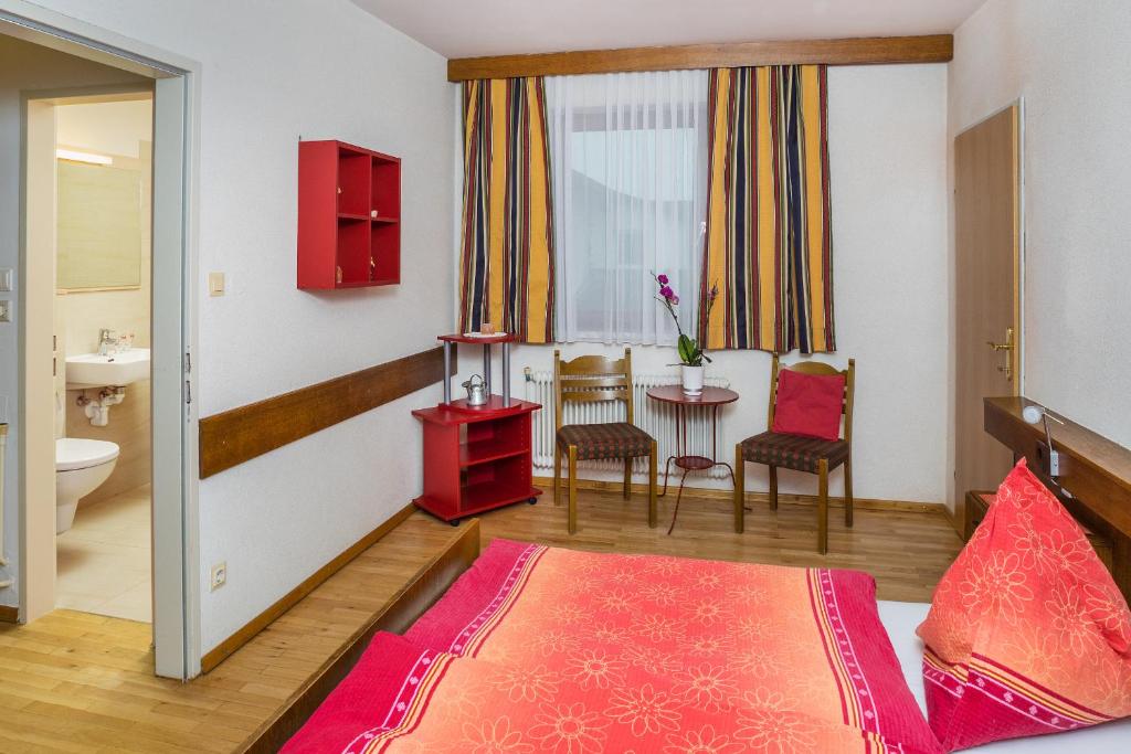 Postel nebo postele na pokoji v ubytování Gasthof Dangl