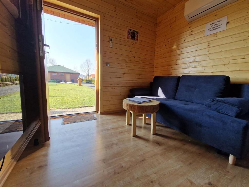 Posedenie v ubytovaní Apartament z Tężnią Solankową, Sauną, Kominkiem LED i Śniadaniem nad Jeziorem Żywieckim