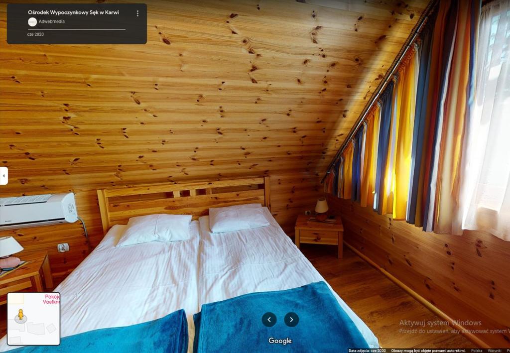 Postel nebo postele na pokoji v ubytování O.W. Sęk