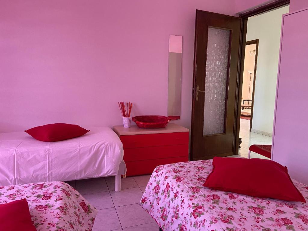 Postel nebo postele na pokoji v ubytování Guest House MICINI