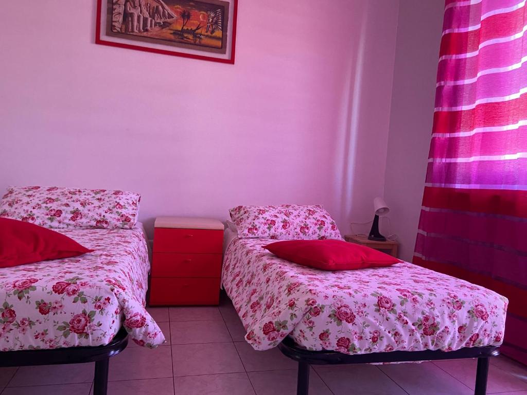 Postel nebo postele na pokoji v ubytování Guest House MICINI