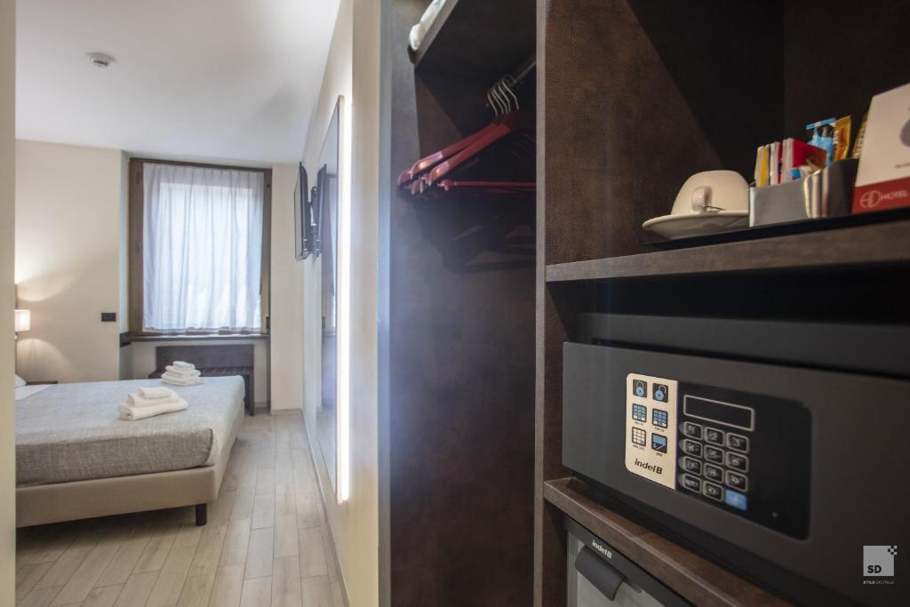 Una cama o camas en una habitación de Hotel Diplomatic
