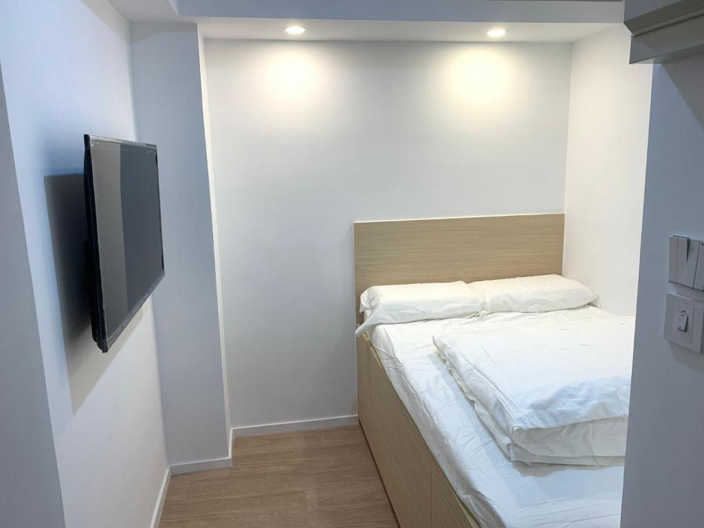 Voodi või voodid majutusasutuse T A B Hotel toas