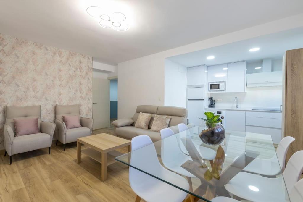 A kitchen or kitchenette at Neptuno Deluxe