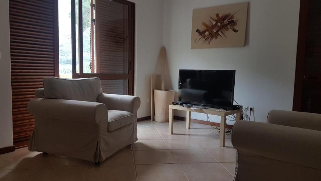 TV a/nebo společenská místnost v ubytování Residencial Lela d'Fermina
