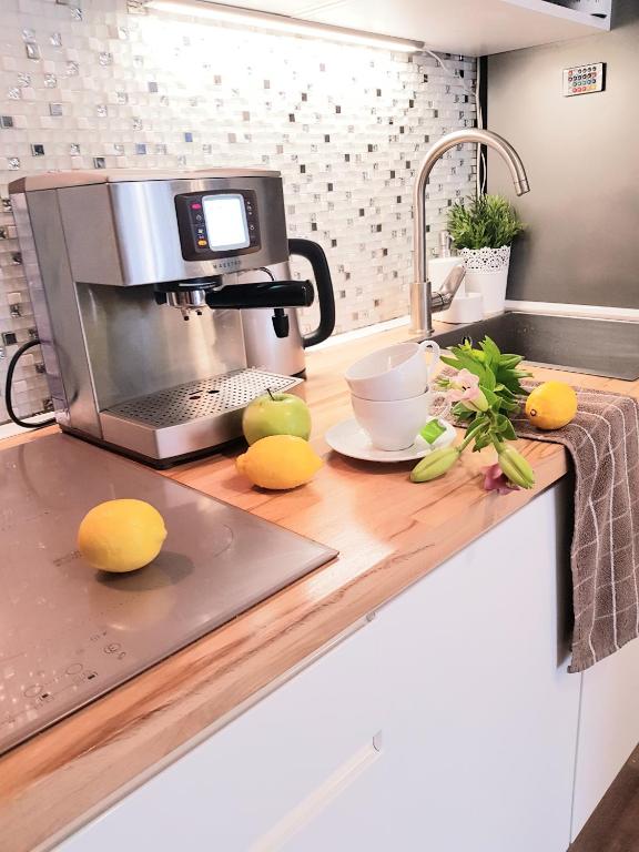 Kuchyňa alebo kuchynka v ubytovaní Apartament & Spa 5 Mórz