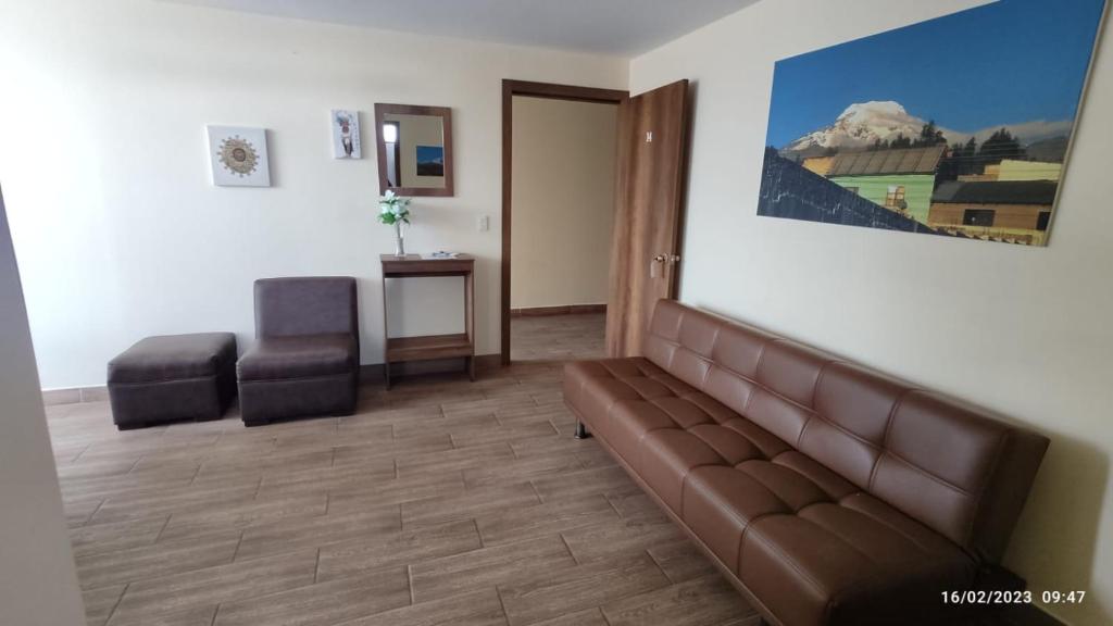 Posezení v ubytování Apart Cayambe