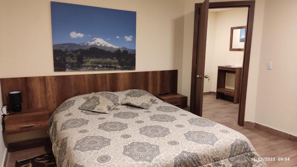 Postel nebo postele na pokoji v ubytování Apart Cayambe