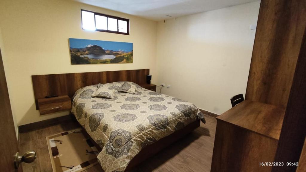 Postel nebo postele na pokoji v ubytování Apart Cayambe