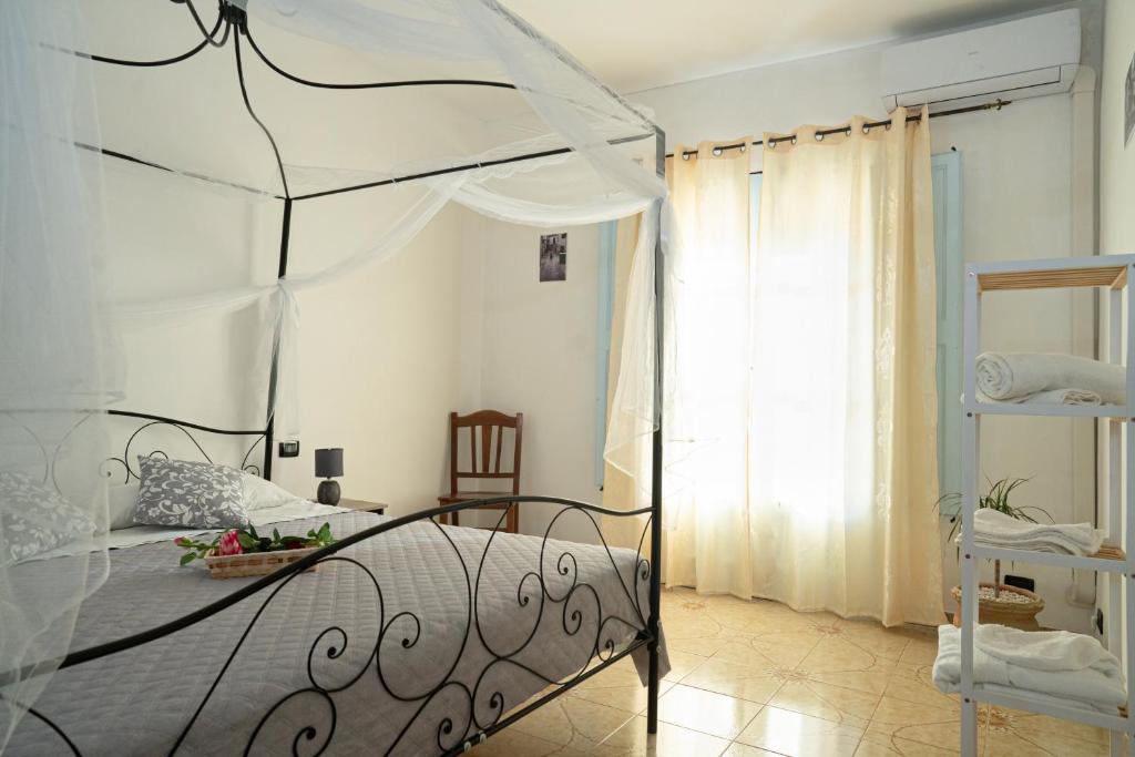 Postel nebo postele na pokoji v ubytování B & B Agrigento antica