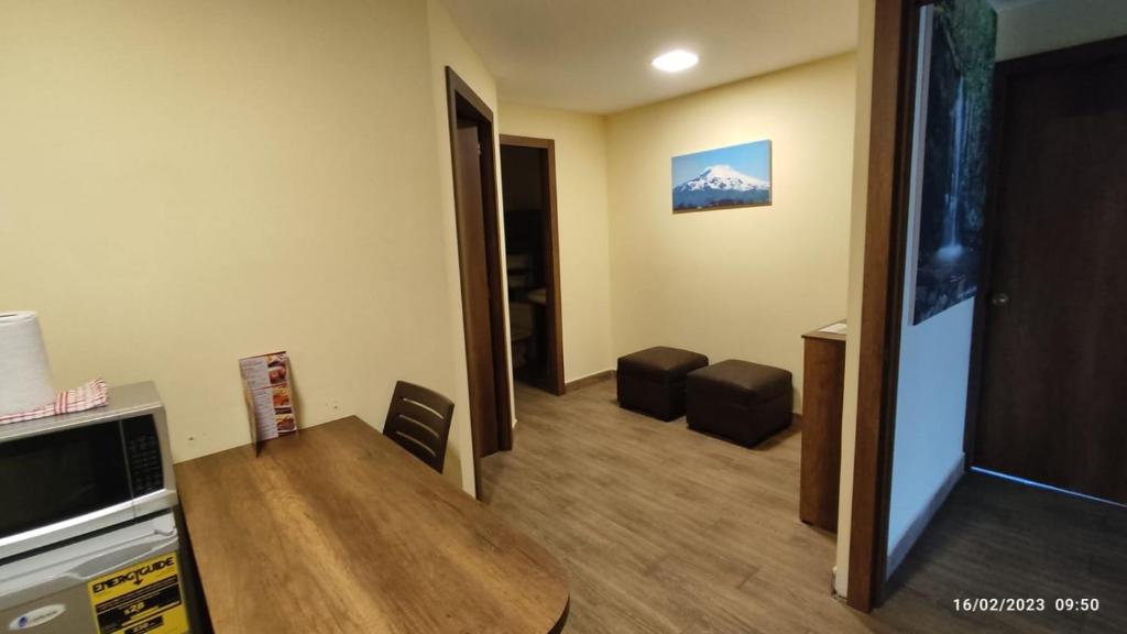 Kuchyň nebo kuchyňský kout v ubytování Apart Cayambe