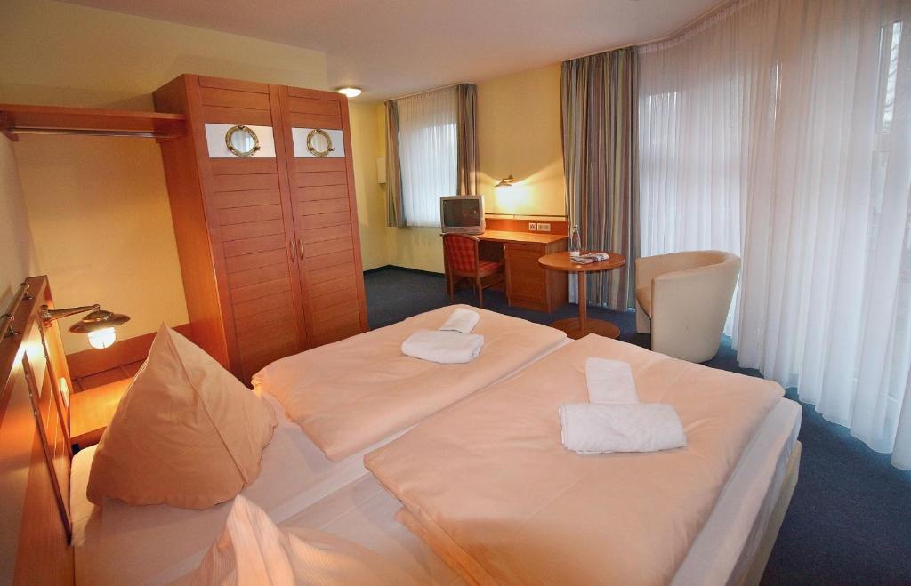 Postel nebo postele na pokoji v ubytování Haus Weida