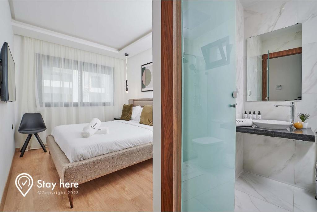 Postel nebo postele na pokoji v ubytování Stayhere Rabat - Hay Riad - Sophisticated Residence