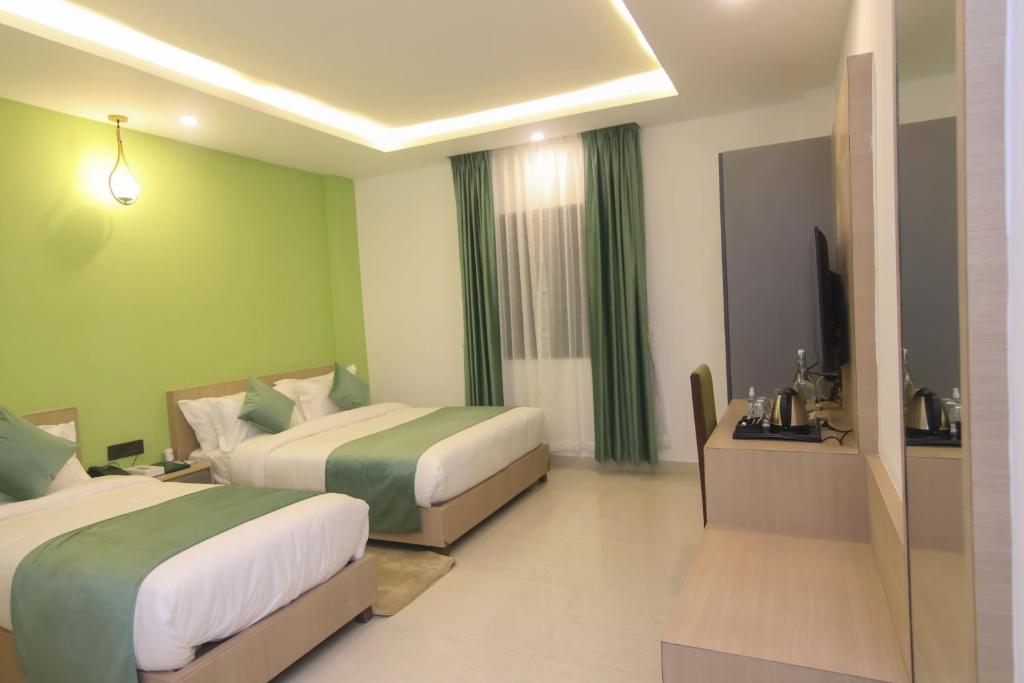 Postel nebo postele na pokoji v ubytování Hotel Aikawa