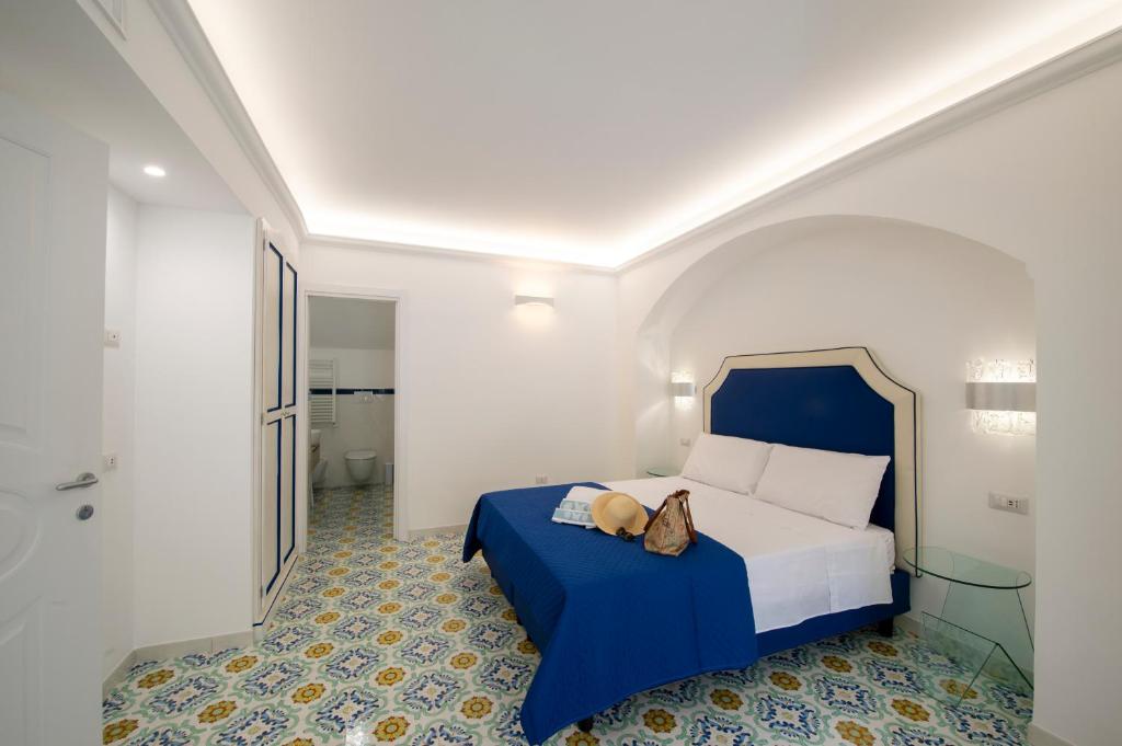 Кровать или кровати в номере CASA DONNA LINDA