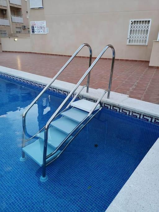 Bazén v ubytování Playa, Port Aventura, Golf, wifi y Parking nebo v jeho okolí