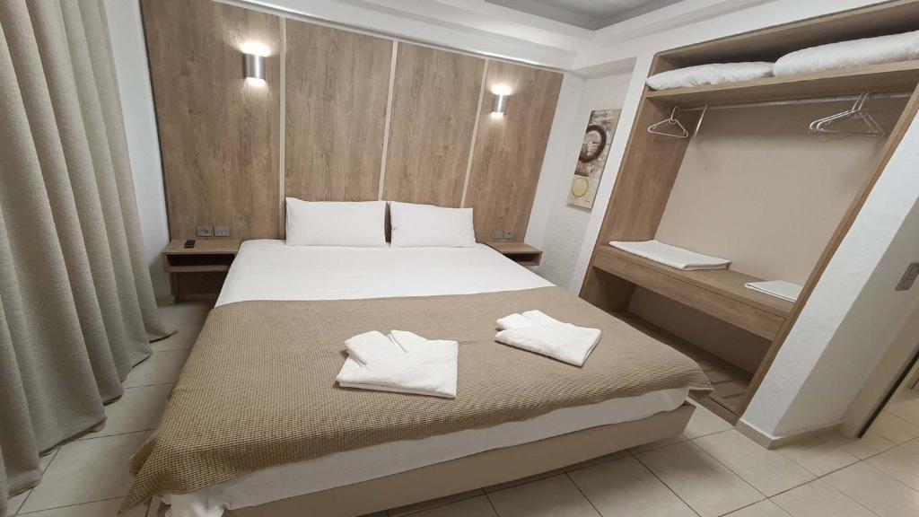 Postel nebo postele na pokoji v ubytování Anastasia Luxury Suites by Xenius Zeus in Nea Flogita