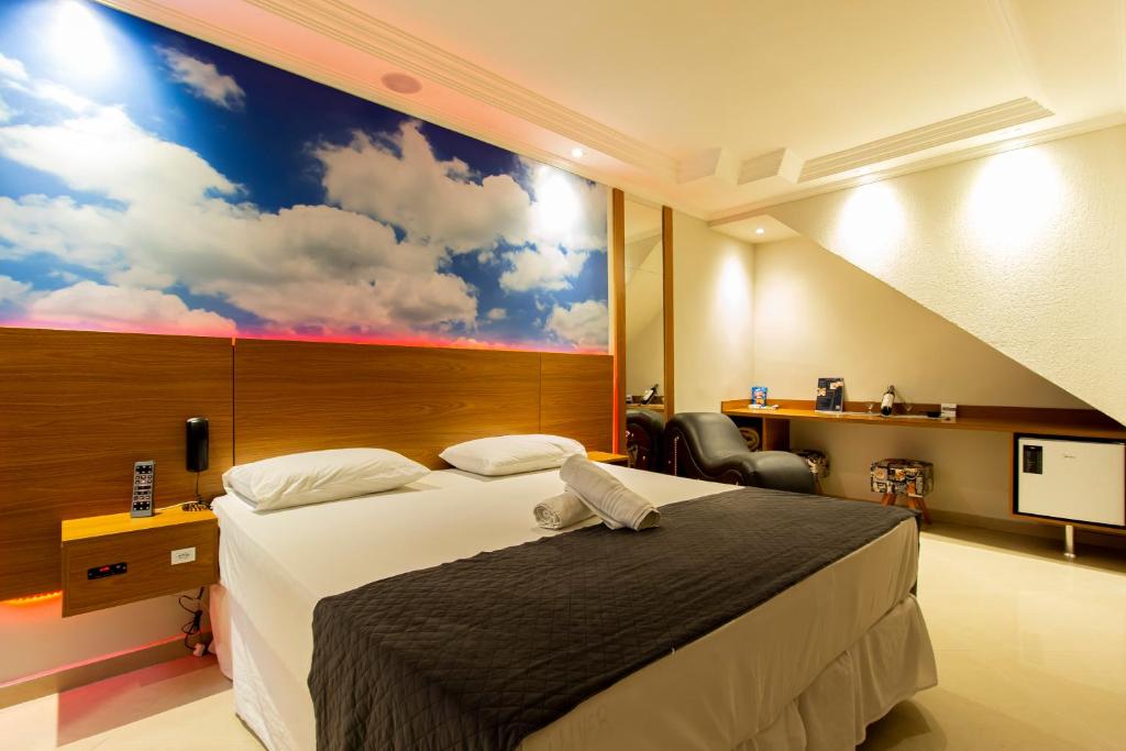 Postel nebo postele na pokoji v ubytování Motel Maresias - Radial Leste