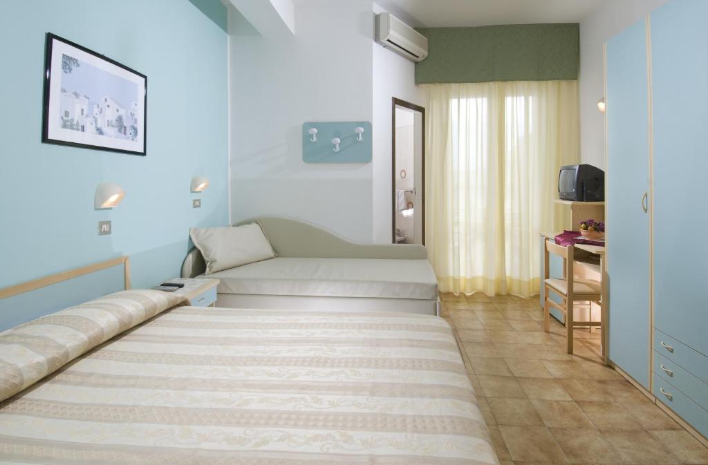 Postel nebo postele na pokoji v ubytování Hotel Solmar