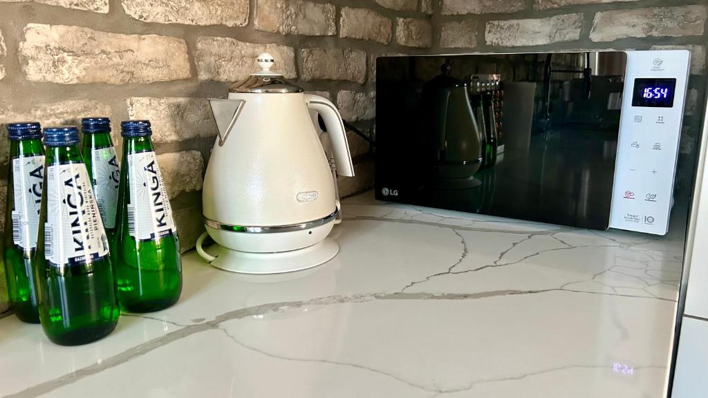 Kuchyňa alebo kuchynka v ubytovaní Apartament Blisko Natury