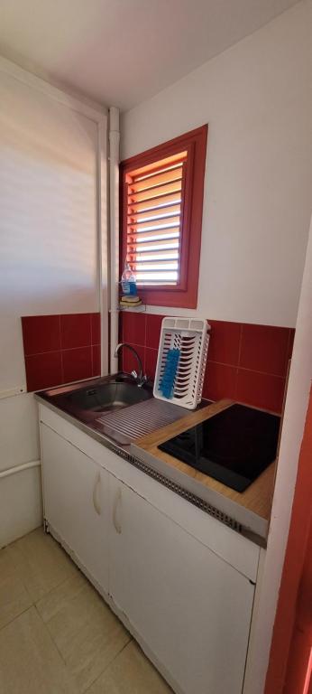 Kuchyň nebo kuchyňský kout v ubytování Turquoise Caritan