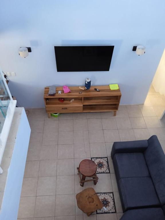 TV a/nebo společenská místnost v ubytování Hotel Mono Azul