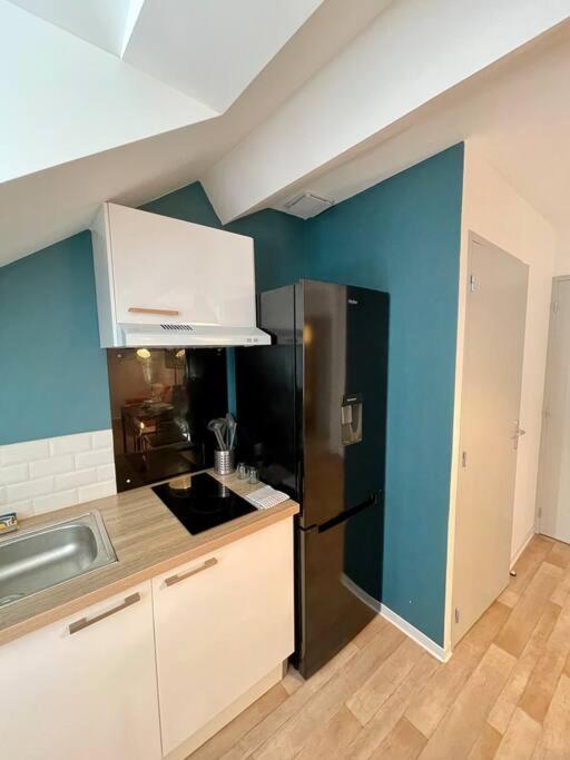 Kuchyňa alebo kuchynka v ubytovaní Appartement Cosy Hyper centre WIFI