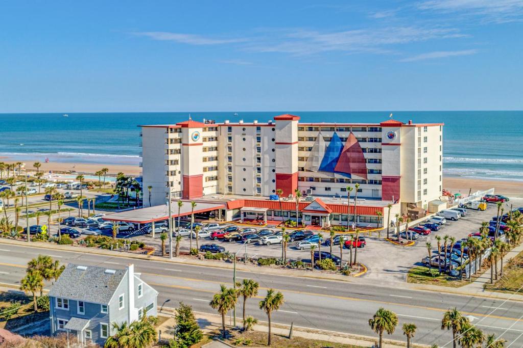 an aerial view of a hotel and the beach at Harbour Beach Resort 611 in Daytona Beach