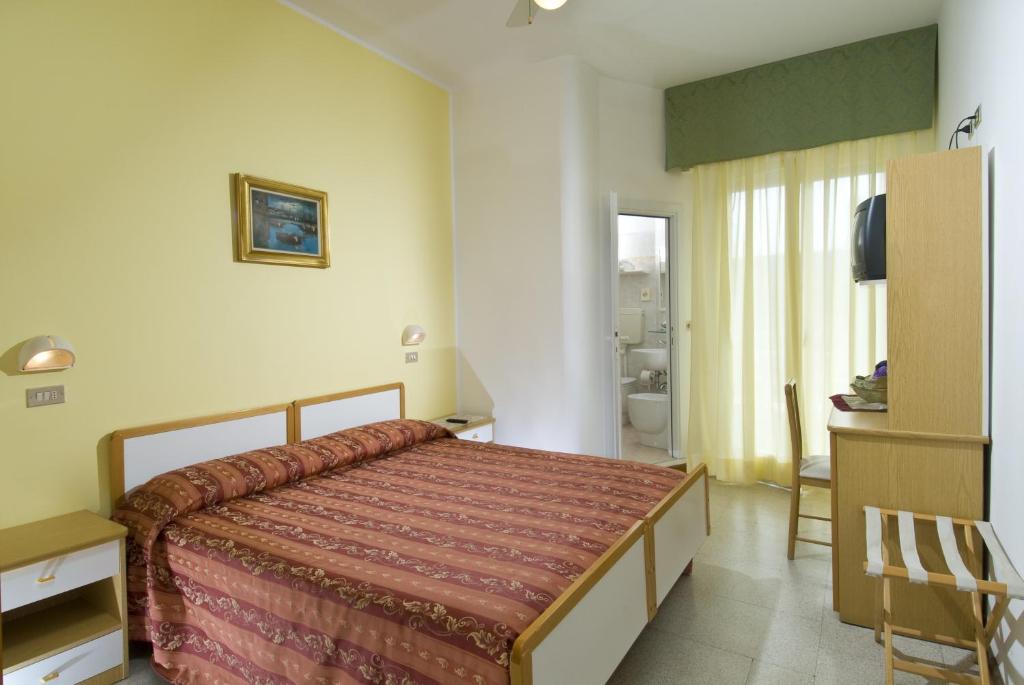 Postel nebo postele na pokoji v ubytování Hotel Solmar